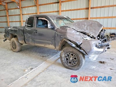 Czwarte zdjęcie samochodu z boku: 2016 TOYOTA TACOMA ACCESS CAB VIN:5TFSX5EN8GX044884 - miniatura