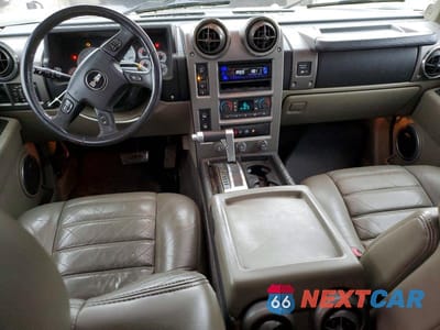 Zdjęcie 8 z 13 samochodu: 2004 HUMMER H2 VIN:5GRGN23U04H102723 - miniatura