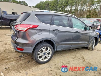 Trzecie zdjęcie samochodu z tyłu: 2016 FORD ESCAPE TITANIUM VIN:1FMCU9J99GUA01892 - miniatura
