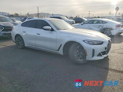 Czwarte zdjęcie samochodu z boku: 2024 BMW I4 EDRIVE 35 VIN:WBY43AW07RFS85410 - miniatura