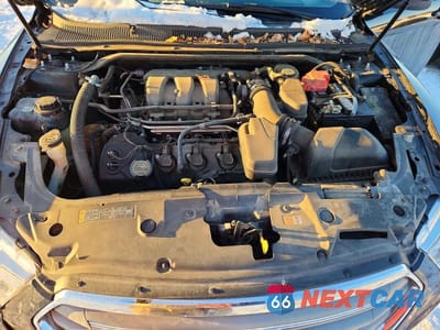 Zdjęcie 11 z 12 samochodu: 2015 FORD TAURUS SEL VIN:1FAHP2E80FG137583 - miniatura