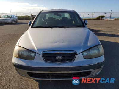 Piąte zdjęcie samochodu w środku: 2003 HYUNDAI ELANTRA GLS VIN:KMHDN45D73U683085 - miniatura