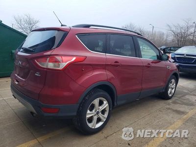 Trzecie zdjęcie samochodu z tyłu: 2016 FORD ESCAPE SE VIN:1FMCU9GX6GUA19420 - miniatura
