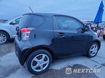 Trzecie zdjęcie samochodu z tyłu: 2012 TOYOTA SCION IQ VIN:JTNJJXB07CJ020831 - miniatura