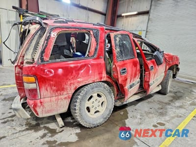 Trzecie zdjęcie samochodu z tyłu: 2002 CHEVROLET TAHOE C1500 VIN:1GNEC13V32R118219 - miniatura