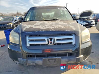 Piąte zdjęcie samochodu w środku: 2007 HONDA PILOT LX VIN:5FNYF18127B018936 - miniatura