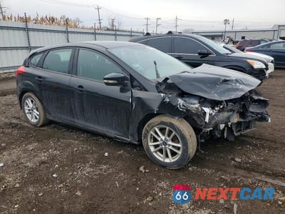 Czwarte zdjęcie samochodu z boku: 2015 FORD FOCUS SE VIN:1FADP3K24FL282217 - miniatura