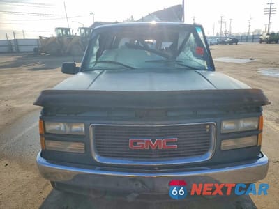 Piąte zdjęcie samochodu w środku: 1995 GMC YUKON VIN:1GKEK13K3SJ764641 - miniatura