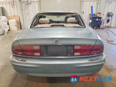 Zdjęcie 6 z 13 samochodu: 2003 BUICK PARK AVENUE ULTRA VIN:1G4CU541334204138 - miniatura