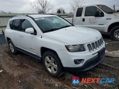 Czwarte zdjęcie samochodu z boku: 2014 JEEP COMPASS LATITUDE VIN:1C4NJDEB6ED826985 - miniatura