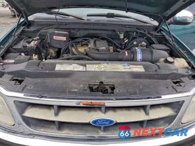 Zdjęcie 11 z 14 samochodu: 1997 FORD F150 VIN:1FTDF1720VKD11808 - miniatura