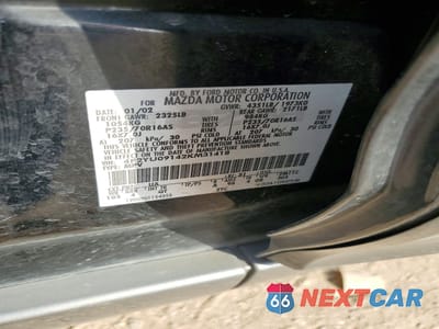 Zdjęcie 12 z 13 samochodu: 2002 MAZDA TRIBUTE LX VIN:4F2YU09142KM31418 - miniatura