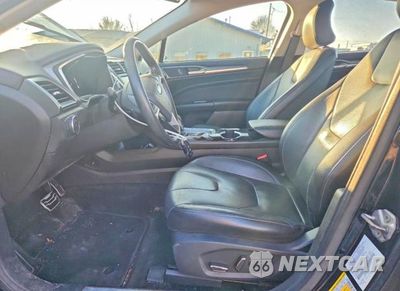 Zdjęcie 7 z 11 samochodu: 2016 FORD FUSION TITANIUM VIN:3FA6P0K98GR361171 - miniatura