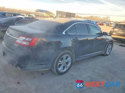 Trzecie zdjęcie samochodu z tyłu: 2016 FORD TAURUS SE VIN:1FAHP2D89GG121952 - miniatura