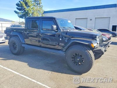 Czwarte zdjęcie samochodu z boku: 2020 JEEP GLADIATOR OVERLAND VIN:1C6HJTFGXLL175209 - miniatura