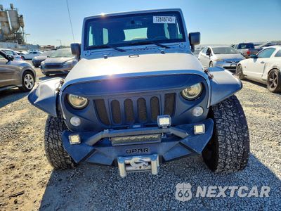 Piąte zdjęcie samochodu w środku: 2015 JEEP WRANGLER UNLIMITED SPORT VIN:1C4BJWDG9FL750701 - miniatura