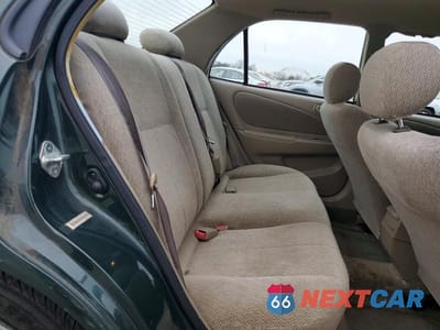 Zdjęcie 10 z 11 samochodu: 2001 TOYOTA COROLLA LE VIN:2T1BR12E01C465897 - miniatura