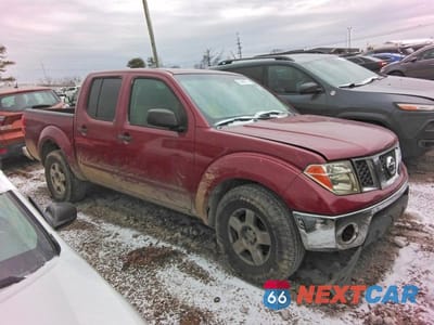 Czwarte zdjęcie samochodu z boku: 2006 NISSAN FRONTIER CREW CAB LE VIN:1N6AD07UX6C409175 - miniatura