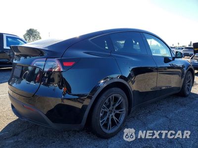 Trzecie zdjęcie samochodu z tyłu: 2024 TESLA MODEL Y VIN:7SAYGDEE7RF164891 - miniatura