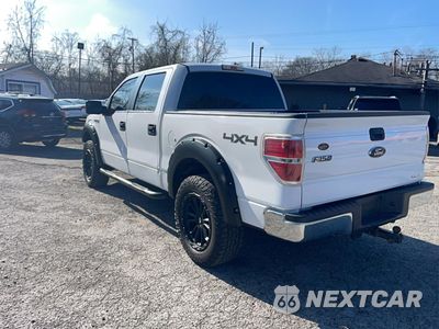 Trzecie zdjęcie samochodu z tyłu: 2014 FORD F150 SUPERCREW VIN:1FTFW1EF2EKE31463 - miniatura