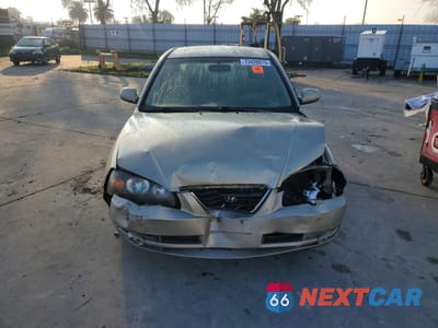 Piąte zdjęcie samochodu w środku: 2005 HYUNDAI ELANTRA GLS VIN:KMHDN46D35U010313 - miniatura