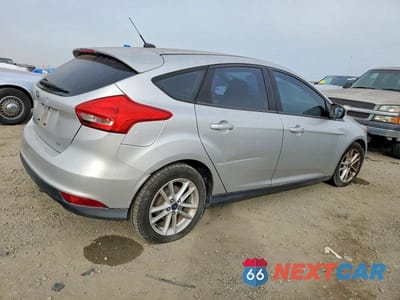 Trzecie zdjęcie samochodu z tyłu: 2015 FORD FOCUS SE VIN:1FADP3K28FL244893 - miniatura