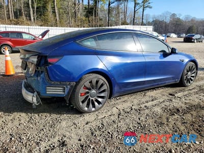 Trzecie zdjęcie samochodu z tyłu: 2022 TESLA MODEL 3 VIN:5YJ3E1EC9NF104535 - miniatura
