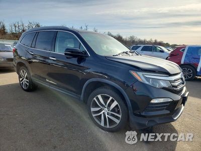 Czwarte zdjęcie samochodu z boku: 2017 HONDA PILOT TOURING VIN:5FNYF6H98HB061245 - miniatura