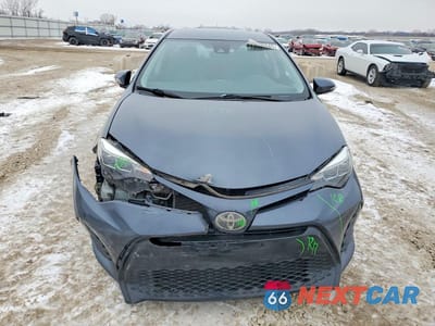 Piąte zdjęcie samochodu w środku: 2017 TOYOTA COROLLA L VIN:5YFBURHE8HP589236 - miniatura