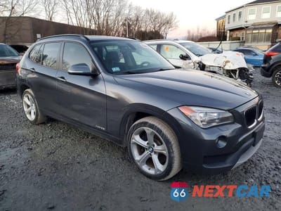 Czwarte zdjęcie samochodu z boku: 2014 BMW X1 XDRIVE35I VIN:WBAVM5C57EVV91353 - miniatura