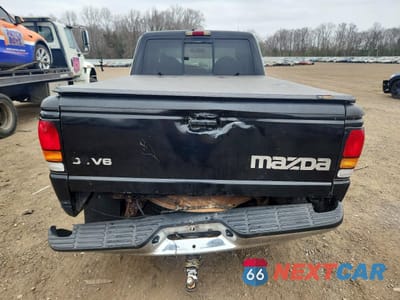 Zdjęcie 6 z 14 samochodu: 1999 MAZDA B3000 CAB PLUS VIN:4F4ZR17V5XTM36878 - miniatura