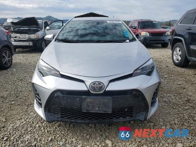 Piąte zdjęcie samochodu w środku: 2017 TOYOTA COROLLA L VIN:5YFBURHE7HP650124 - miniatura