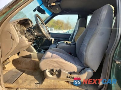Zdjęcie 7 z 11 samochodu: 1999 FORD EXPLORER VIN:1FMYU24E8XUB41907 - miniatura