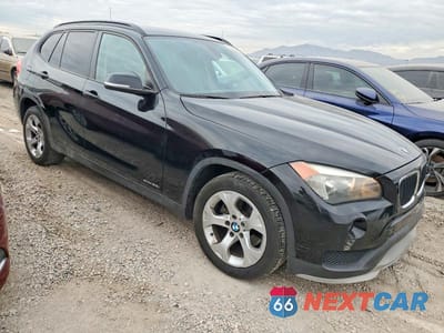 Czwarte zdjęcie samochodu z boku: 2015 BMW X1 SDRIVE28I VIN:WBAVM1C51FVW58586 - miniatura