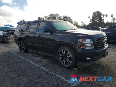 Czwarte zdjęcie samochodu z boku: 2019 CHEVROLET SUBURBAN K1500 PREMIER VIN:1GNSKJKJXKR101261 - miniatura