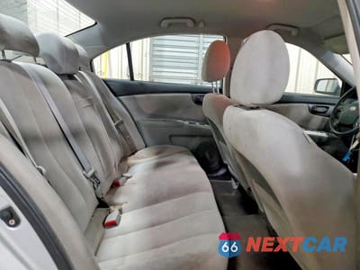 Zdjęcie 10 z 11 samochodu: 2009 KIA OPTIMA LX VIN:KNAGE228495302533 - miniatura