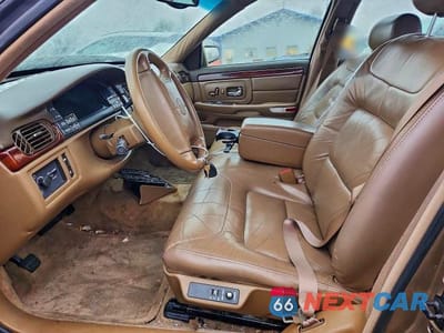 Zdjęcie 7 z 12 samochodu: 1998 CADILLAC DEVILLE VIN:1G6KD54YXWU733378 - miniatura