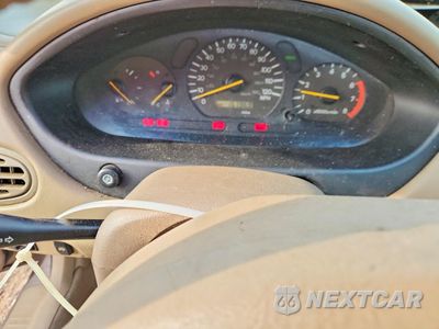 Zdjęcie 9 z 13 samochodu: 2000 MITSUBISHI GALANT ES VIN:4A3AA46G2YE093029 - miniatura