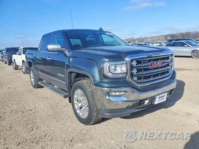 Czwarte zdjęcie samochodu z boku: 2017 GMC SIERRA K1500 SLT VIN:3GTU2NEC4HG166881 - miniatura