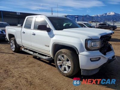 Czwarte zdjęcie samochodu z boku: 2017 GMC SIERRA K1500 SLT VIN:1GTV2NEJ7HZ102210 - miniatura