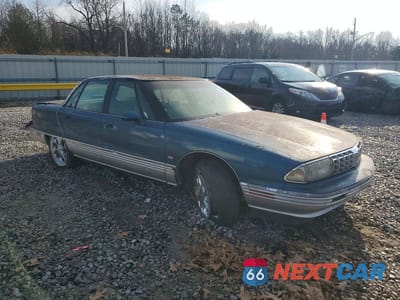 Czwarte zdjęcie samochodu z boku: 1992 OLDSMOBILE 98 REGENCY ELITE VIN:1G3CW53LXN4323308 - miniatura