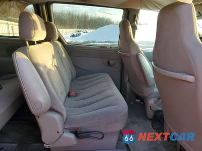 Zdjęcie 11 z 13 samochodu: 2003 CHRYSLER VOYAGER LX VIN:1C4GJ45303B115891 - miniatura