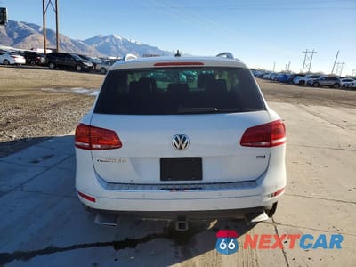 Zdjęcie 6 z 12 samochodu: 2014 VOLKSWAGEN TOUAREG V6 TDI VIN:WVGEP9BP8ED011467 - miniatura