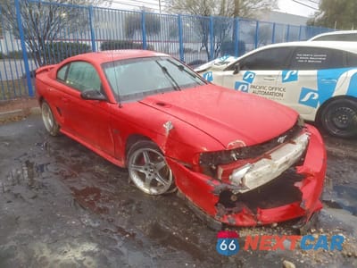 Czwarte zdjęcie samochodu z boku: 1998 FORD MUSTANG GT VIN:1FAFP42X5WF206594 - miniatura