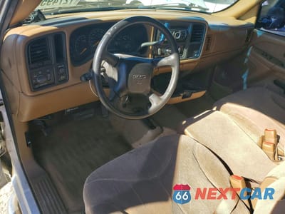 Zdjęcie 8 z 13 samochodu: 2000 GMC NEW SIERRA K1500 VIN:1GTEK14TXYZ322212 - miniatura