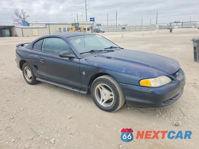 Czwarte zdjęcie samochodu z boku: 1997 FORD MUSTANG VIN:1FALP4047VF201438 - miniatura