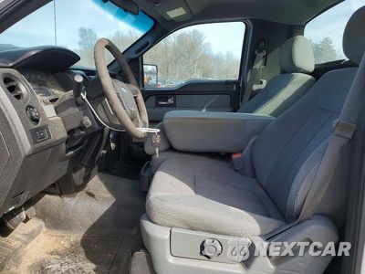 Zdjęcie 7 z 13 samochodu: 2014 FORD F150 VIN:1FTNF1CF1EKD17694 - miniatura