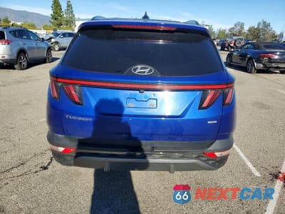Zdjęcie 6 z 12 samochodu: 2022 HYUNDAI TUCSON VIN:5NMJECAE0NH075564 - miniatura