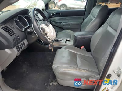 Zdjęcie 7 z 13 samochodu: 2014 TOYOTA TACOMA V6 VIN:5TFLU4EN7EX085270 - miniatura