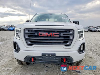 Piąte zdjęcie samochodu w środku: 2021 GMC SIERRA K1500 AT4 VIN:3GTP9EEL9MG368912 - miniatura